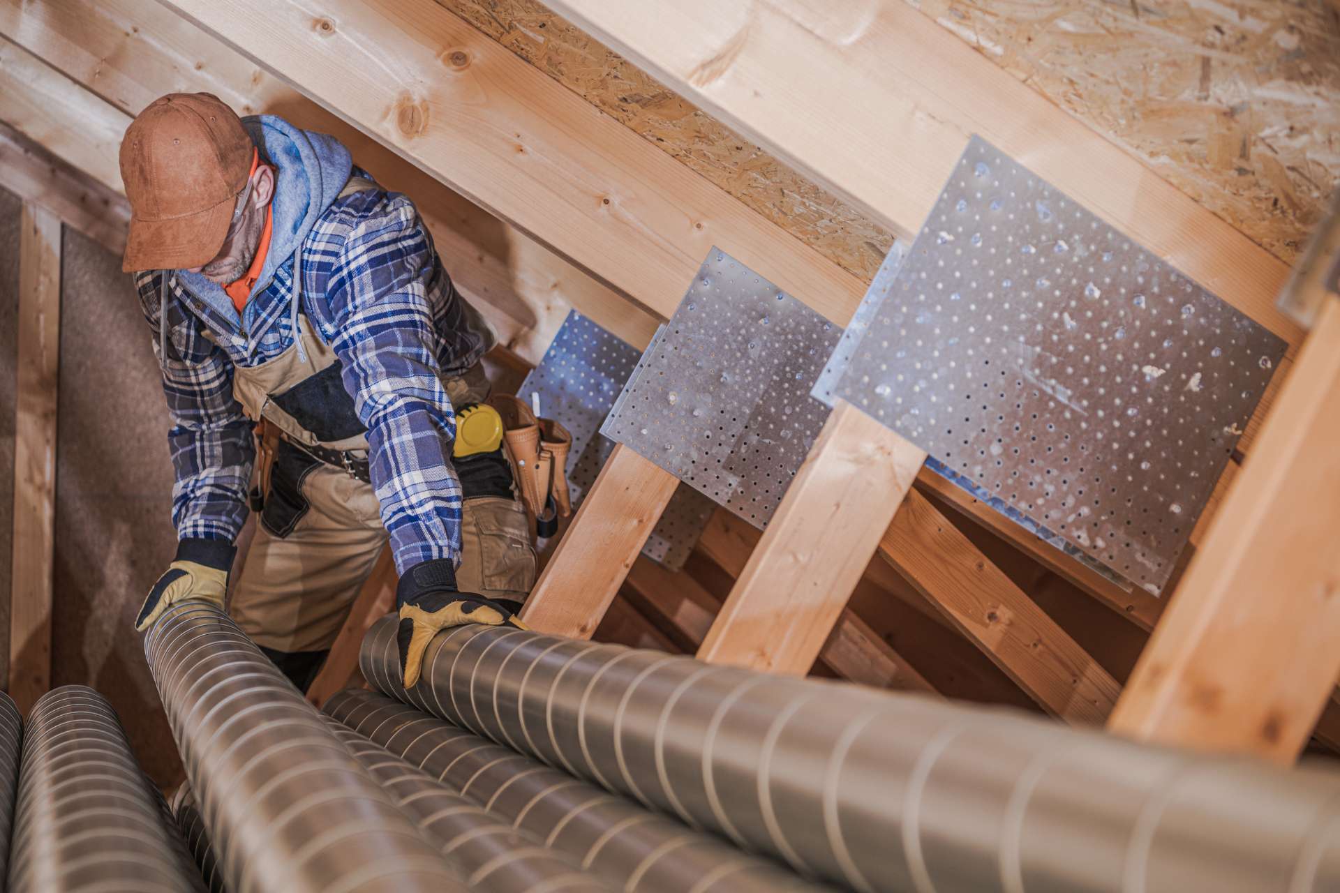hvac technician assembling air vent in house 2025 03 15 21 36 41 utc Home Hi, I’m Lenny — Executive Home Comfort Advisor at Everest Heating & Cooling.